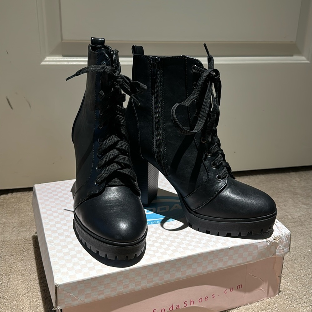 Like new. Soda lace up booties.